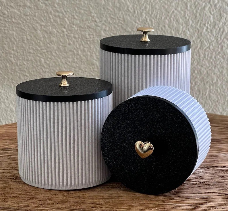 Modern Ribbed Canisters with black lid and cool marble base